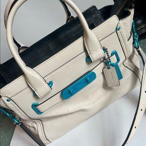 Blue, White, and Black Coach Purse
